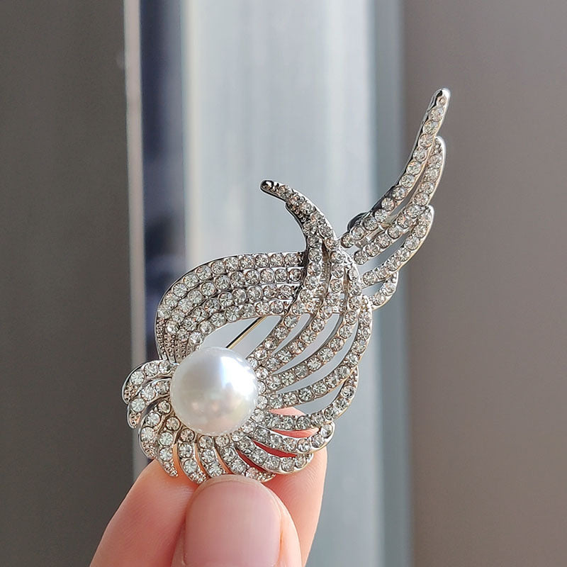Stylish brooch pinned on a coat
