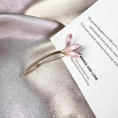 Floral brooch against a neutral background