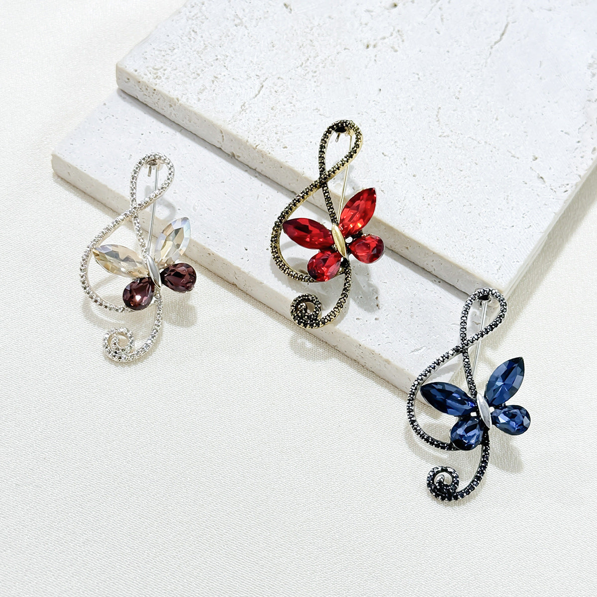 Close-up of crystal details on the butterfly brooch