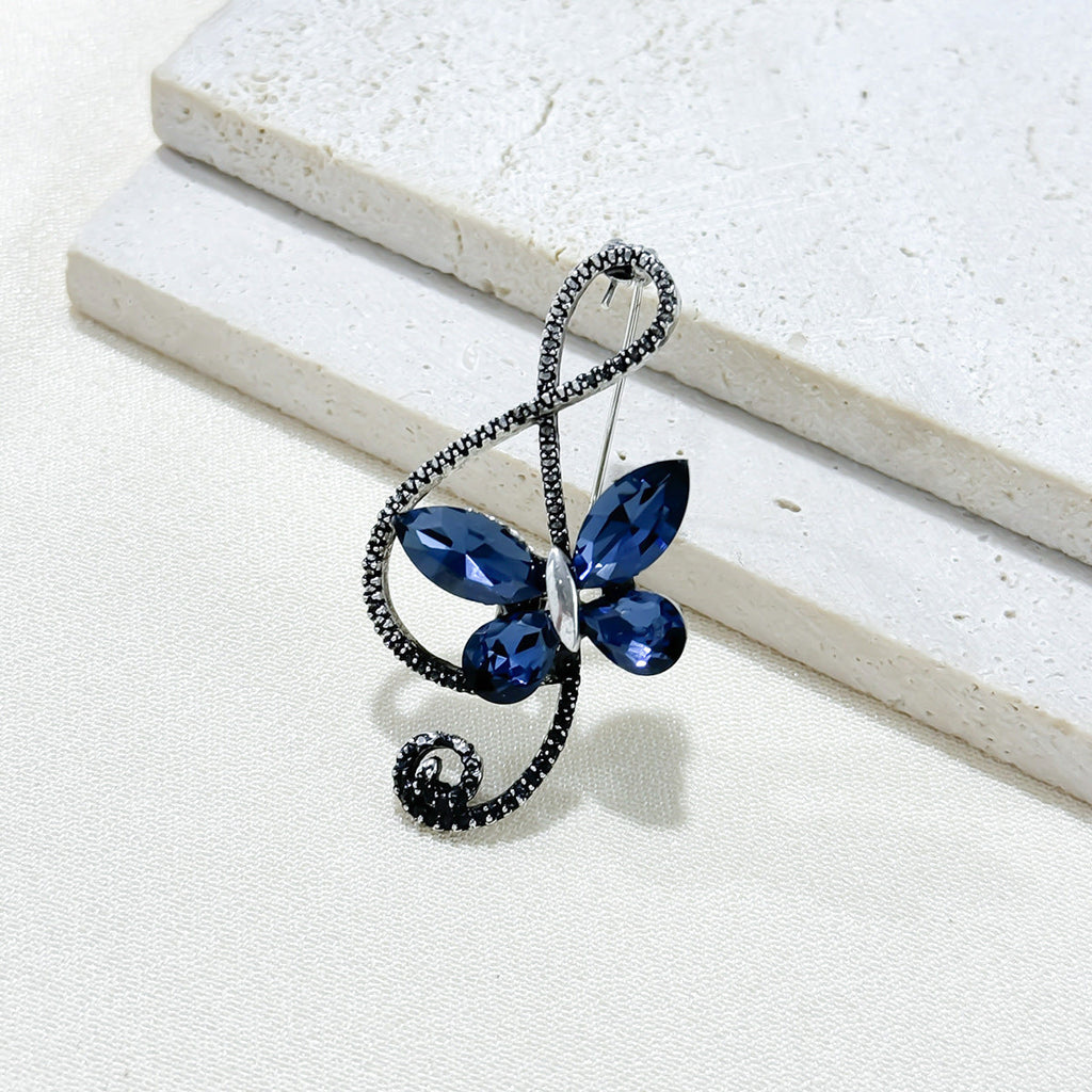Lifestyle image of the butterfly brooch on display