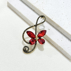 Full view of butterfly crystal note brooch