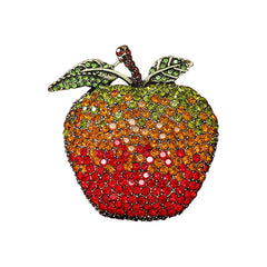 Vibrant apple design brooch on a colourful background