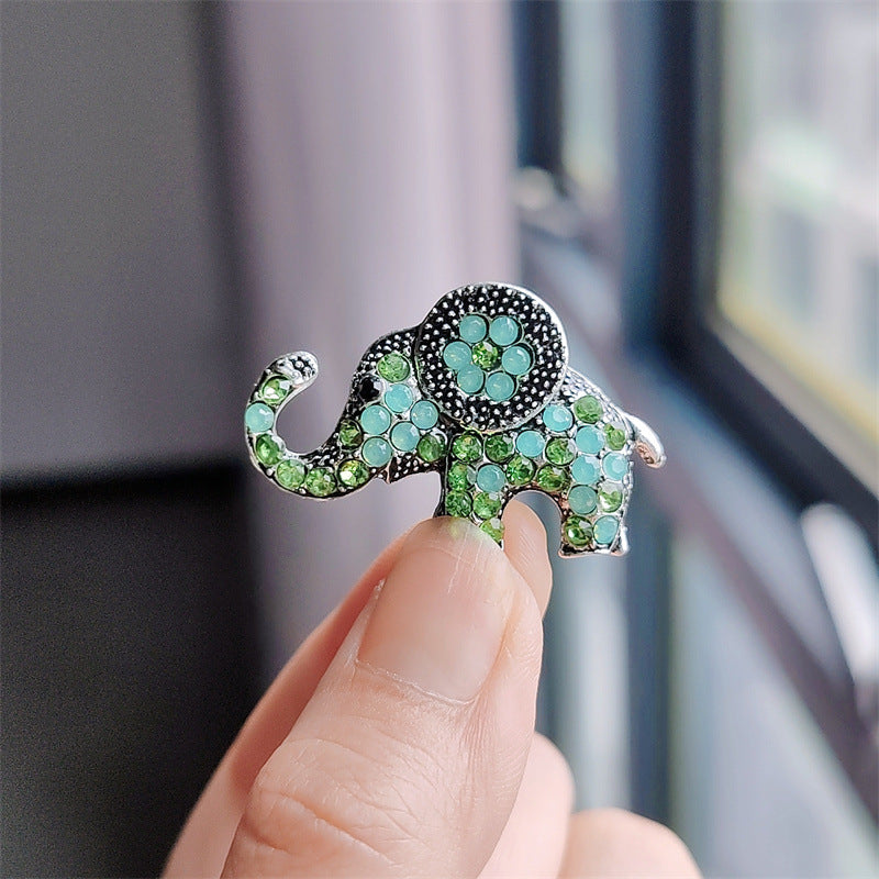 Detailed view of alloy elephant brooch