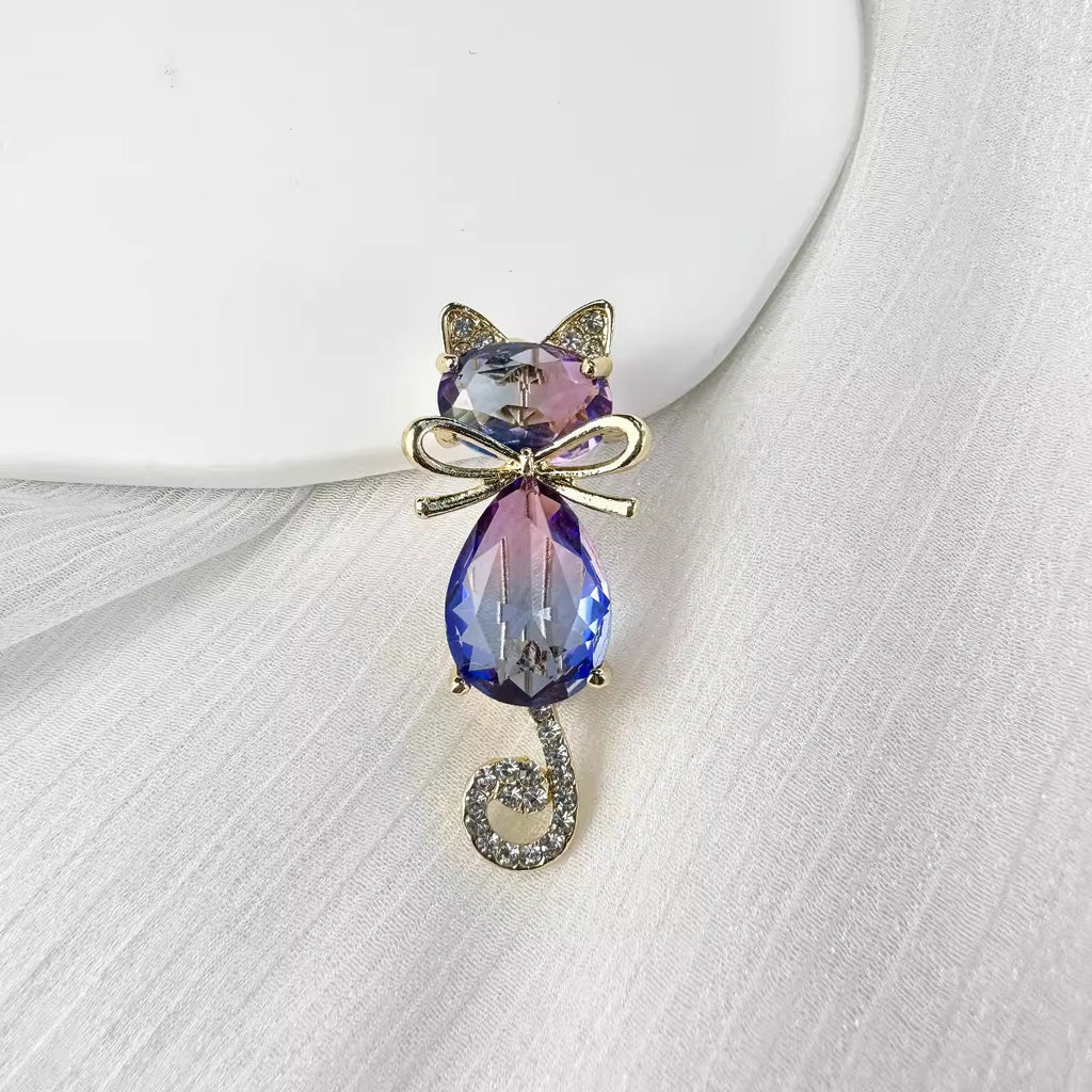 Iridescent cat brooch pin side view