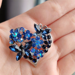 Butterfly Heart Brooch pinned on a coat