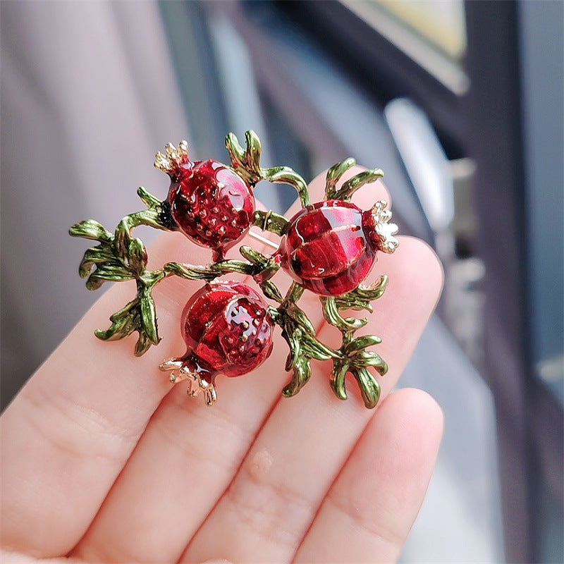Brooch on a stylish jacket showcasing fruit theme