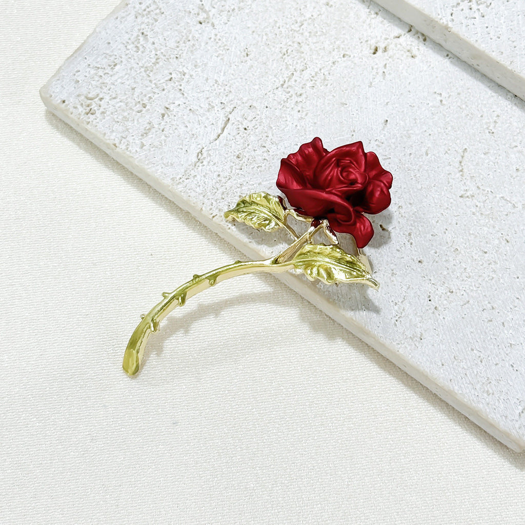 Wearing the Elegant Red Rose Brooch
