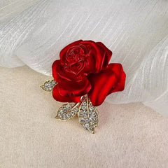 Close-up of rose flower brooch pin