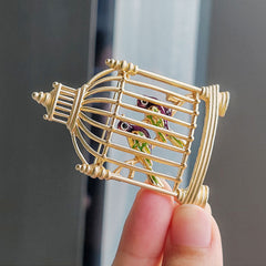 Elegant Vintage Birdcage Brooch with Bird Design - Image 1