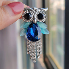 Green owl pin with sparkling embellishments