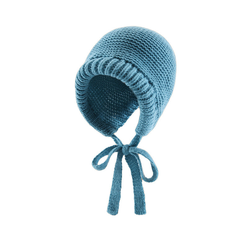 Knitted beanie showing side view in khaki