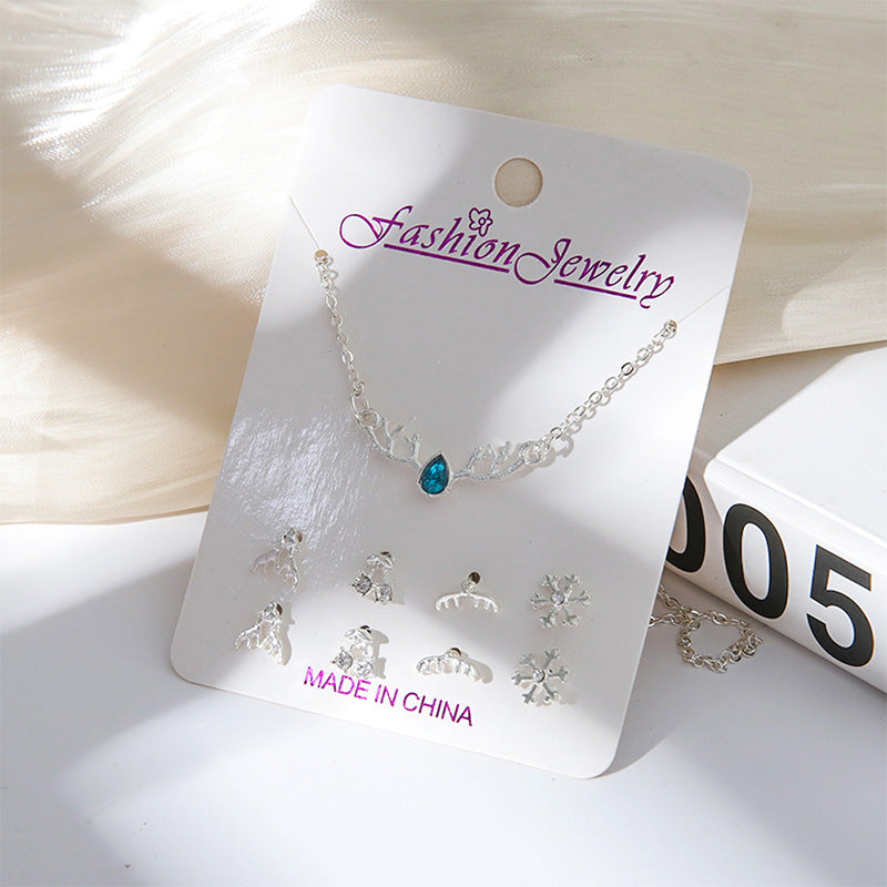 Beauty shot of gold jewelry set for women