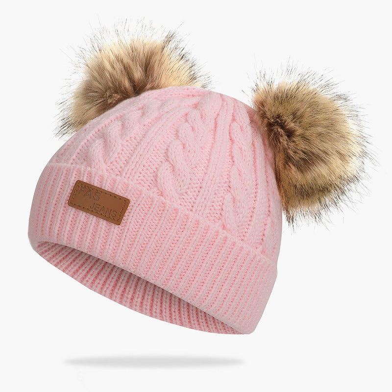 Kids wearing winter hat and scarf outdoors