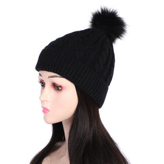 Light grey knit beanie hat with pom pom