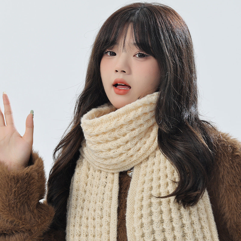 Stylish white knit winter set on display