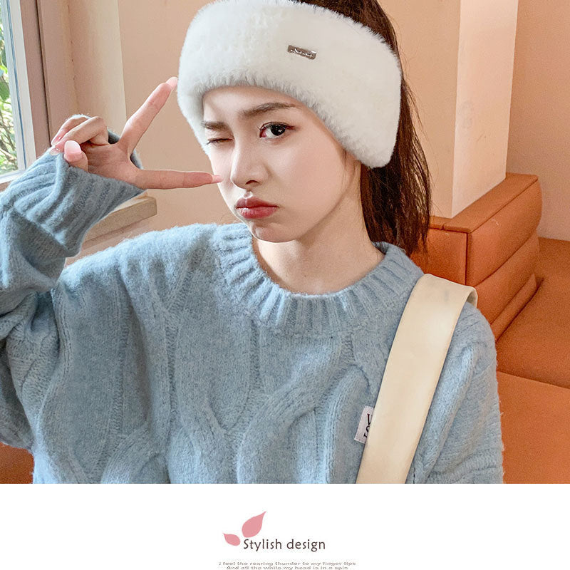 Close-up of a women's ear warmer beanie from the top view