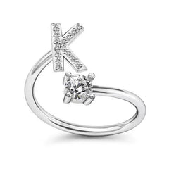 Fashionable women's alphabet ring on display
