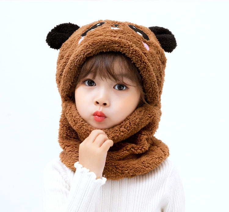 Children enjoying outdoor activities in winter wear