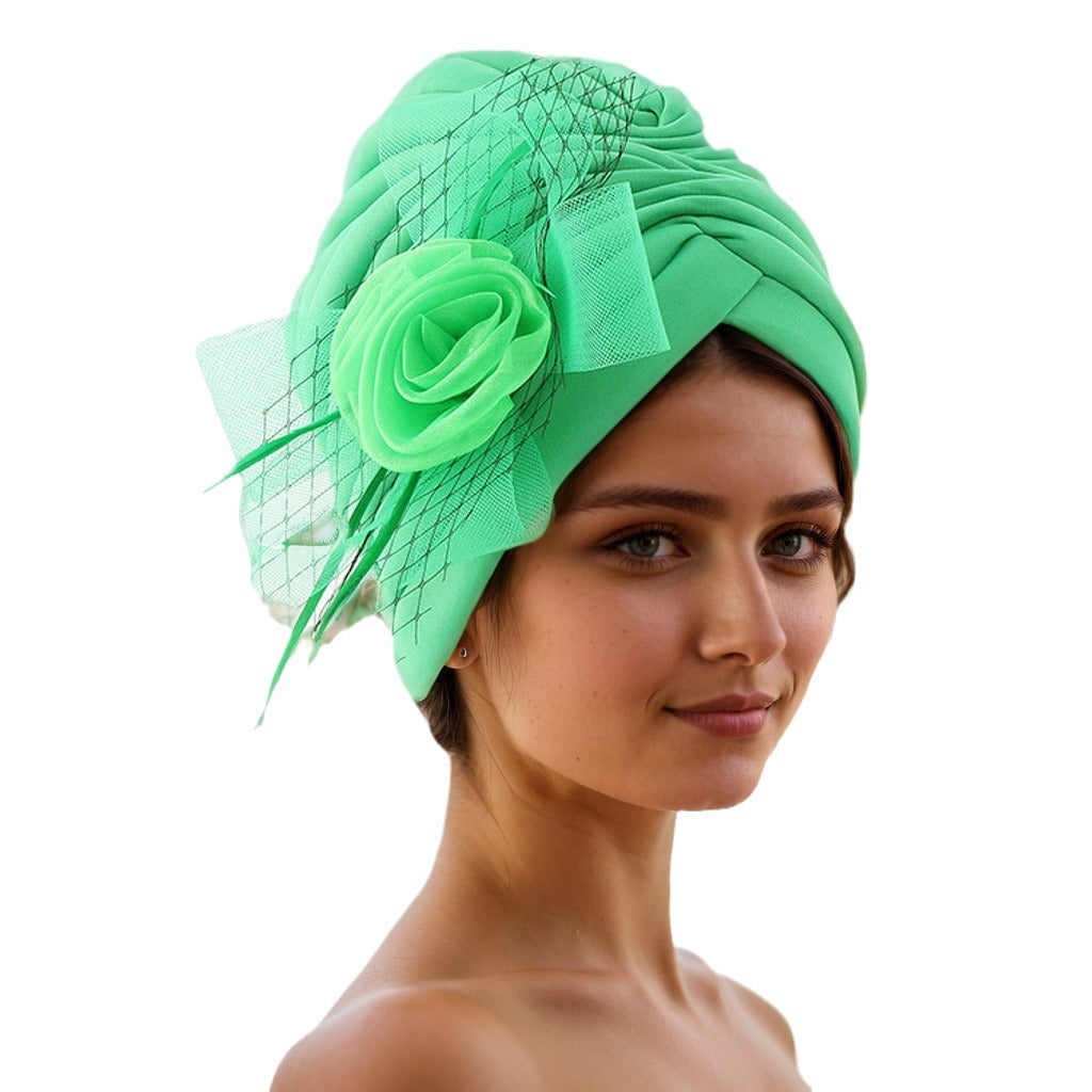 green Muslim skull cap on display