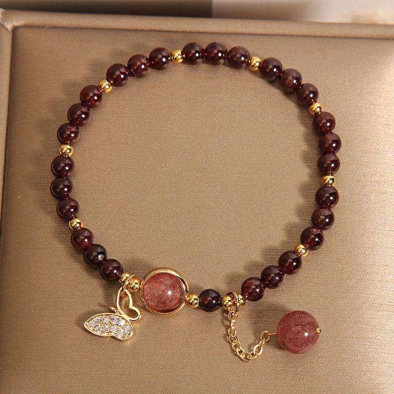Stylish garnet bracelet worn on wrist