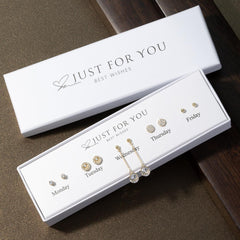 close-up of elegant heart and flower drop earrings image 2