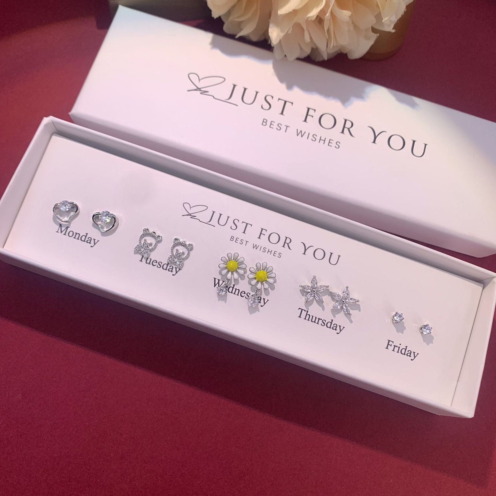 Floral design S925 silver earrings close up