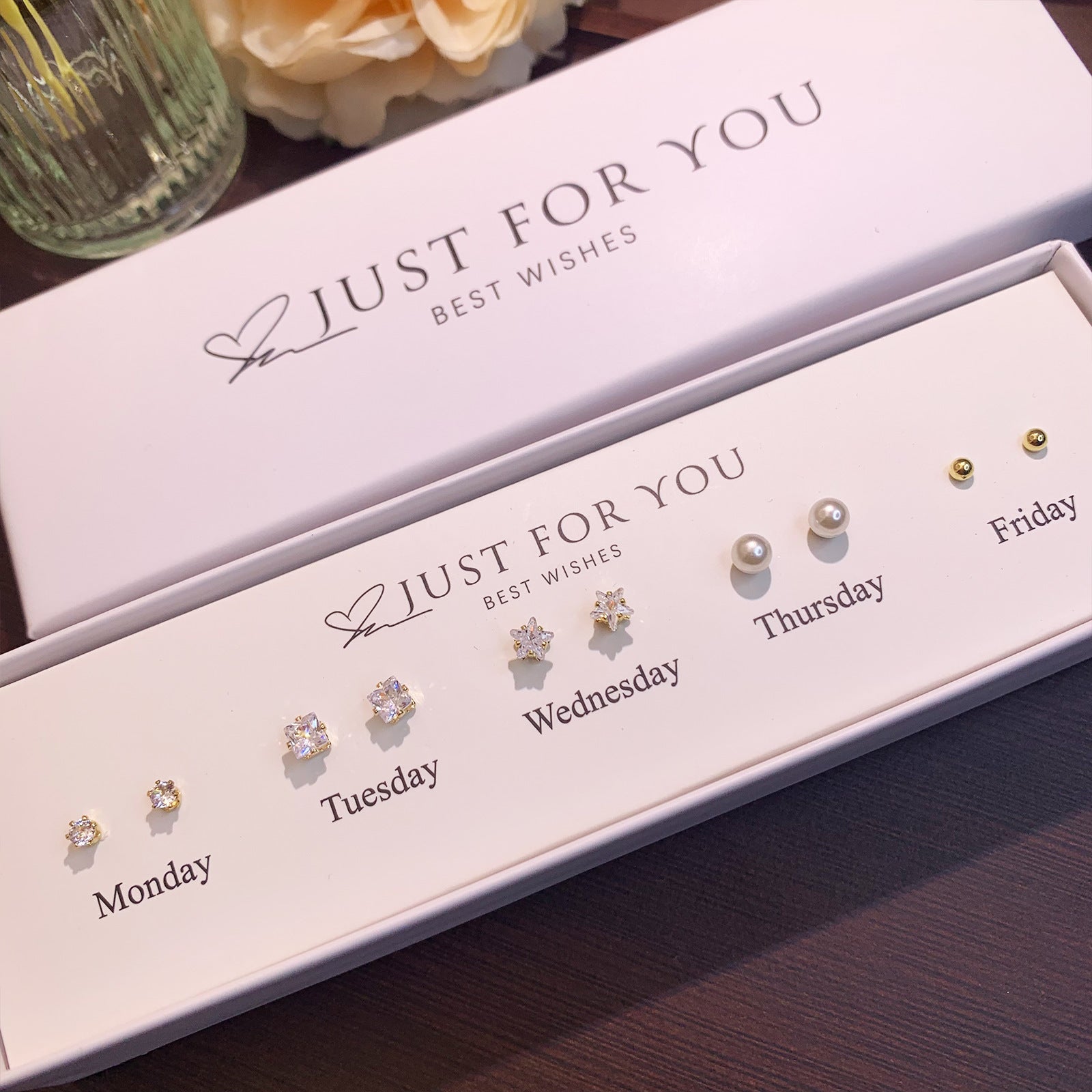 Charming S925 Silver Heart Cat Ear Studs on display