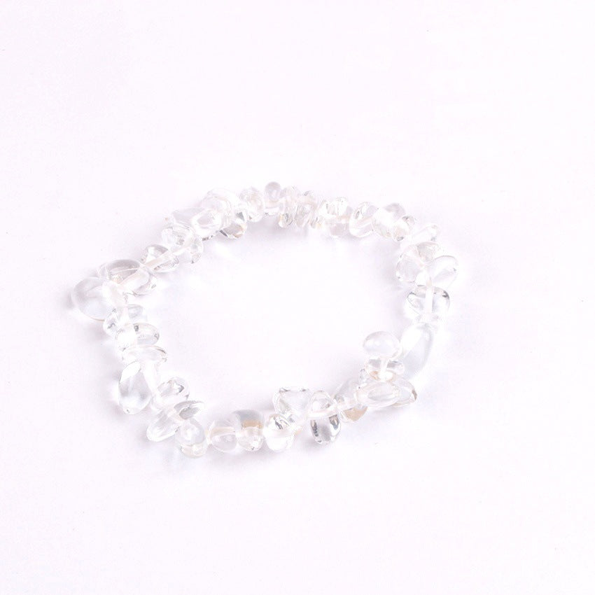 Close-up of colourful crystal charms on bracelet