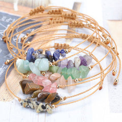 Elegant handcrafted bracelet displayed on wooden surface