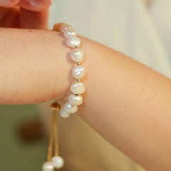 Elegant faux pearl bracelet showcasing various angles
