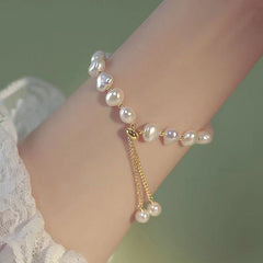 Handcrafted irregular design pearl bracelet on model