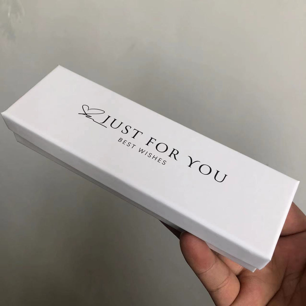 Elegant gift presentation with ribbons and tags