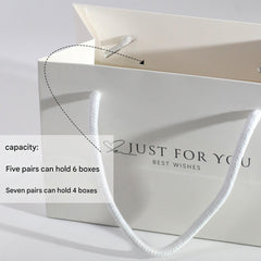 Multicoloured elegant gift bags displayed
