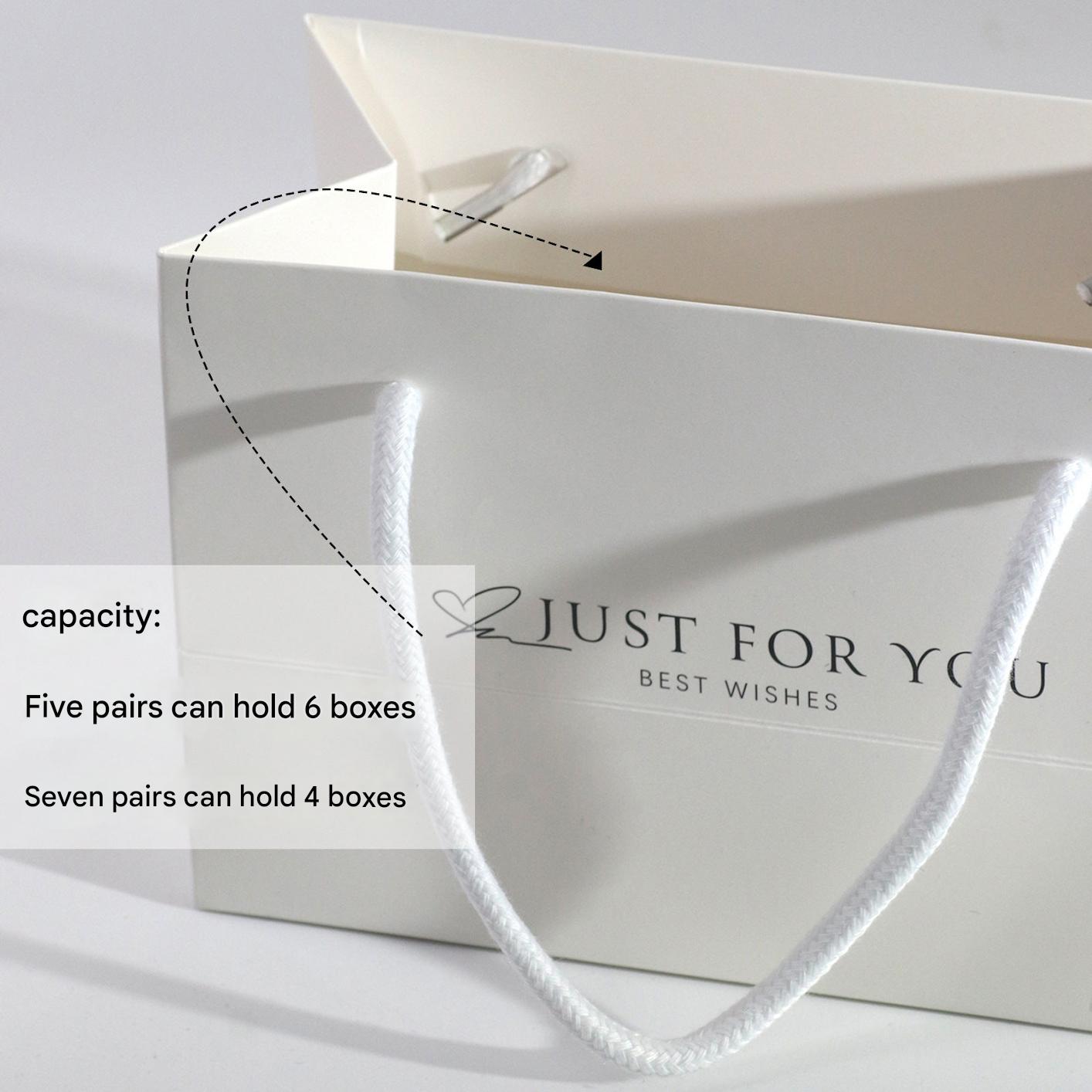 Multicoloured elegant gift bags displayed