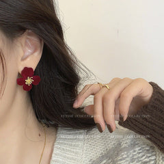 Floral Earrings showcased on a model