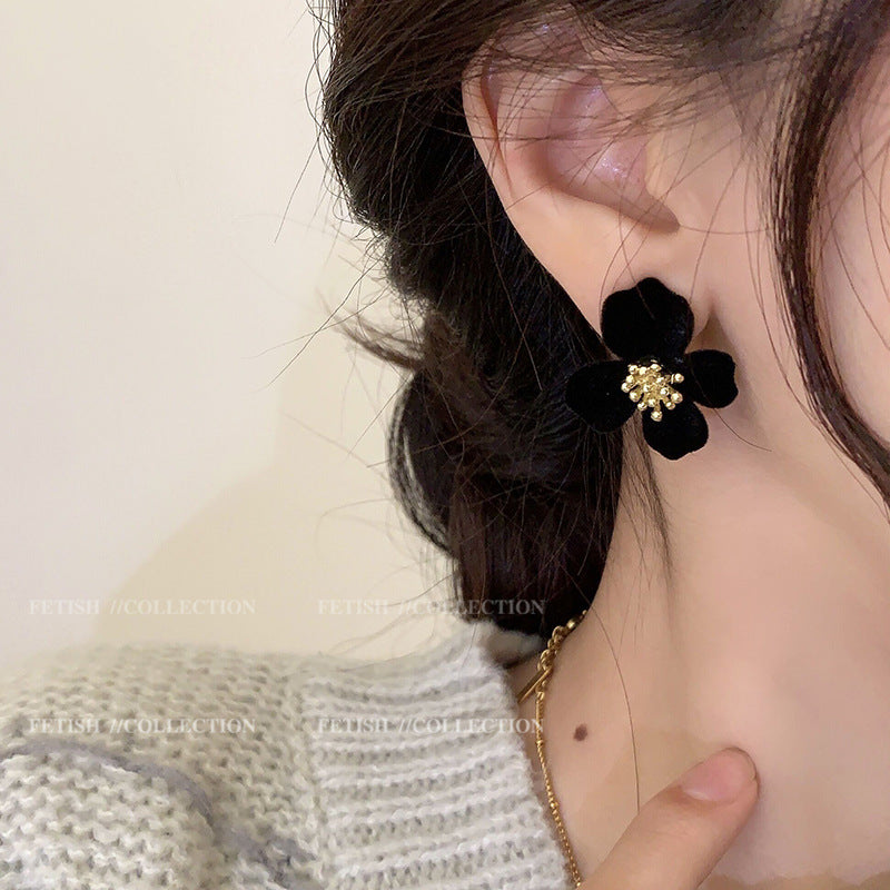 Stylish Velvet Floral Earrings displayed in a box