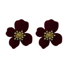 Chic Velvet Earrings on a wooden background