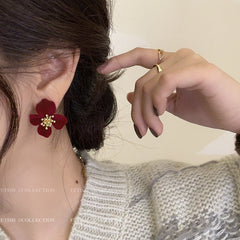 Elegant Earrings on a stylish fabric surface