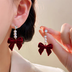 Elegant pearl earrings suitable for festive wear