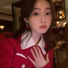 Stylish red velvet bow earrings on display