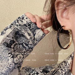 Elegant earrings displayed for casual outfit pairing