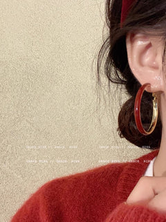 Unique design circle earrings on white background