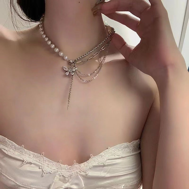 Butterfly pearl necklace side view
