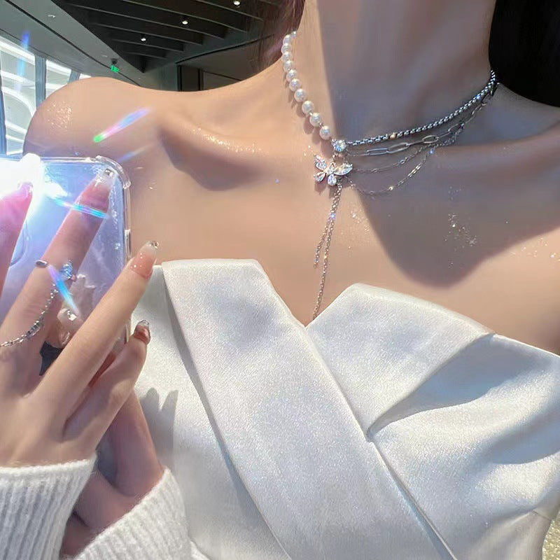 Butterfly pearl necklace side view