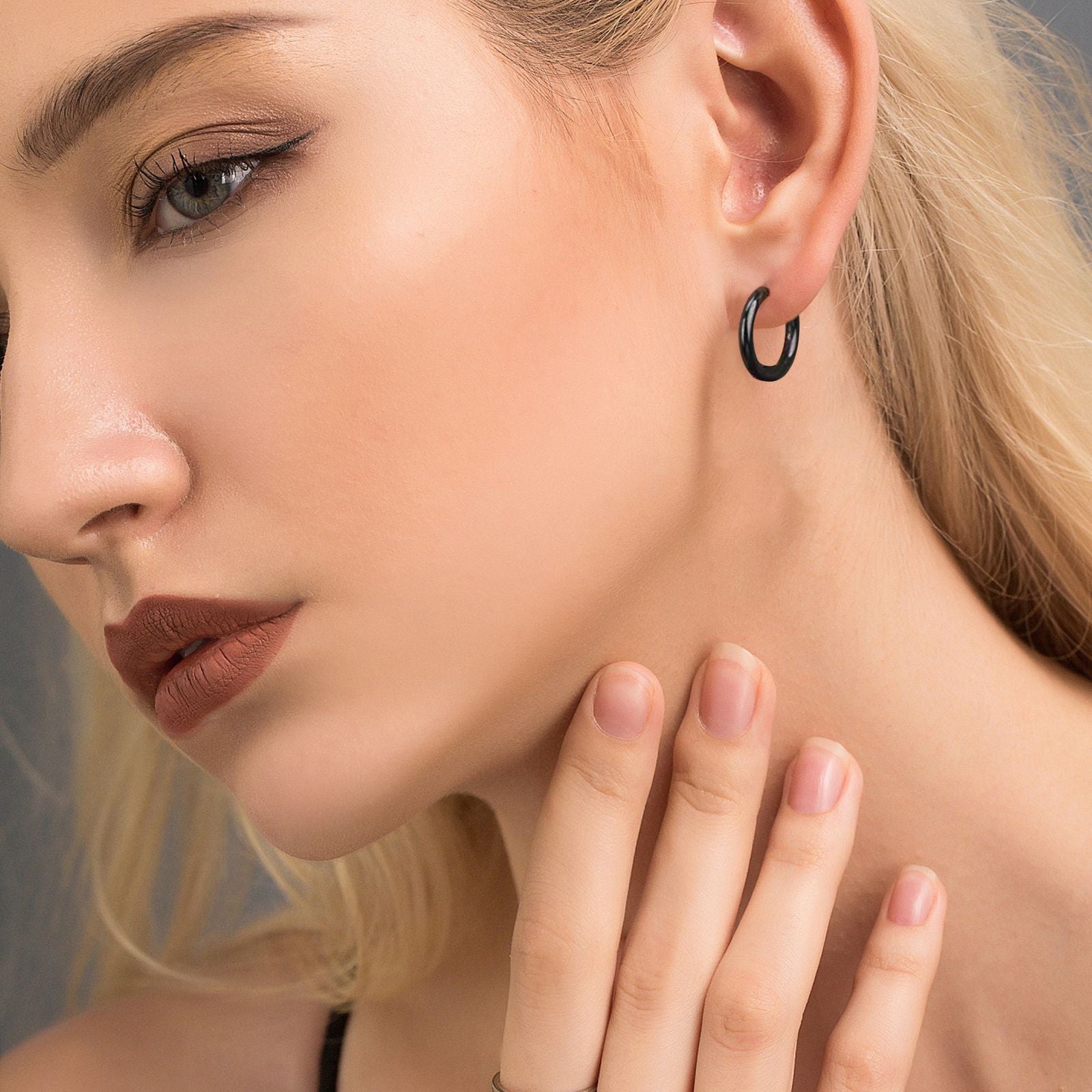 Trendy hoop earrings showcased on a model