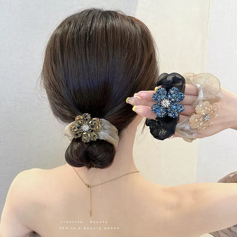 elegant gold clover pattern hair tie
