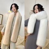 Close-up of faux fur long scarf in grey