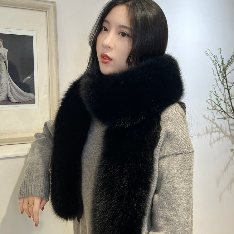 Close-up of faux fur long scarf in grey