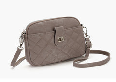 Lifestyle image of woman carrying the phone bag outdoors