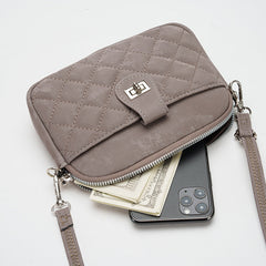 Lifestyle image of woman carrying the phone bag outdoors